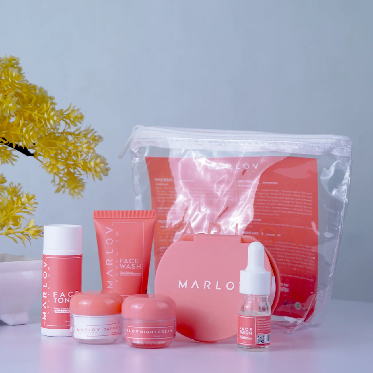 Skincare set featuring creams, toner, and face wash in modern packaging.